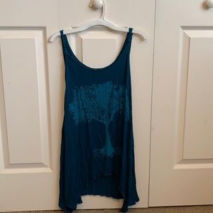 Soft, long, & flowy tank top in turquoise.